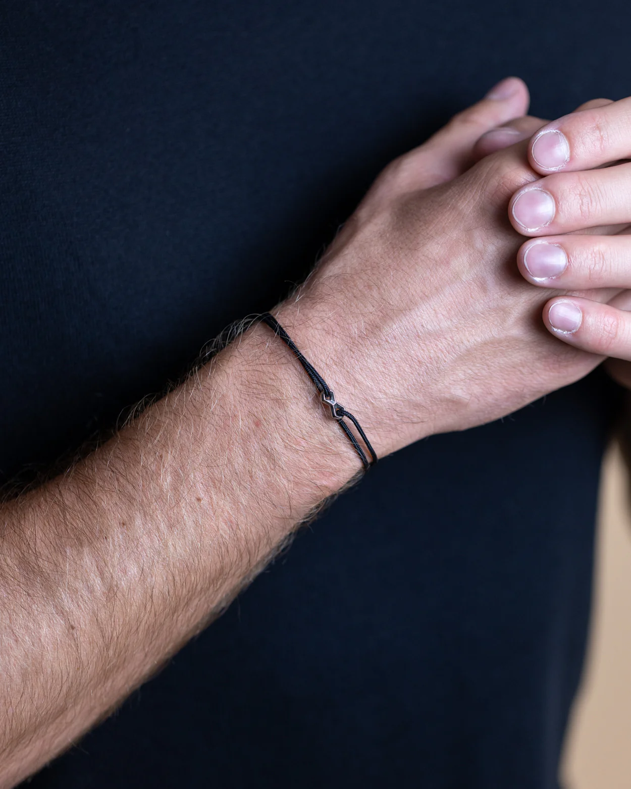 Black nylon bracelet with a silver infinity sign - Image 4