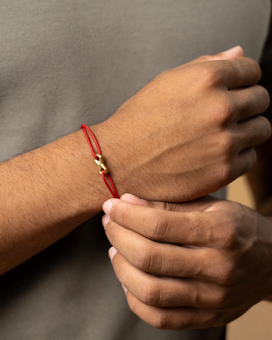 Red nylon bracelet with a titanium infinity sign - Image 2